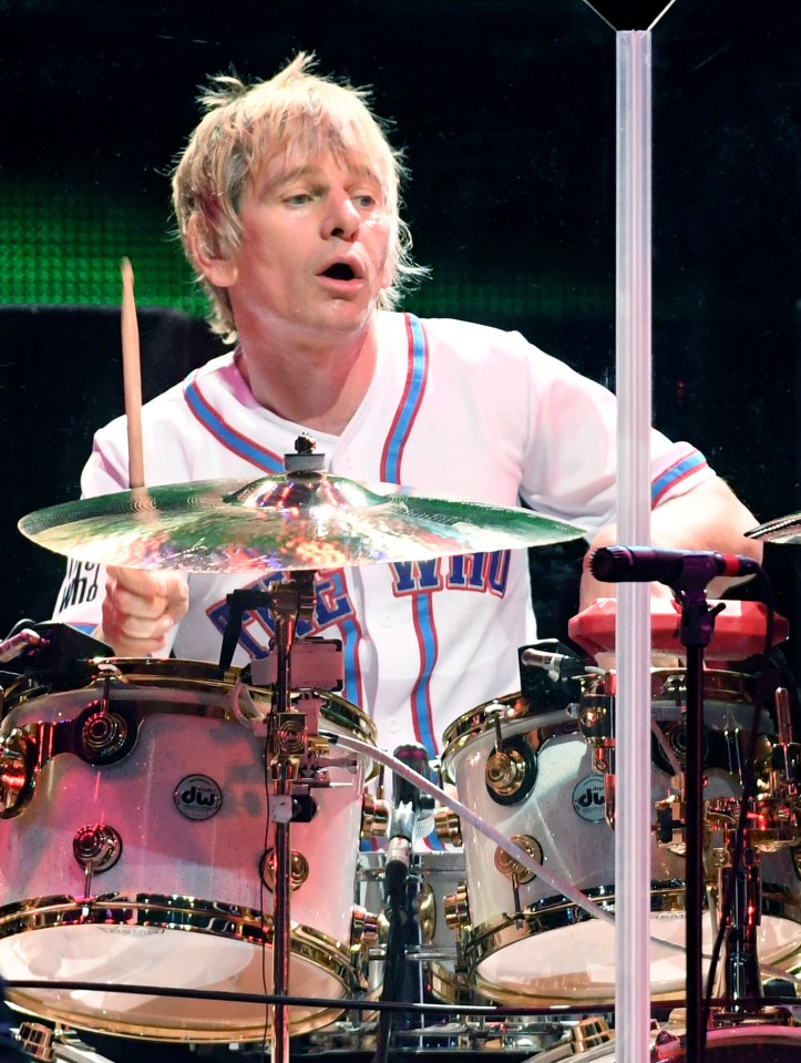 Zak Starkey of The Who performing on drums.